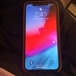 iPhone X black used. bought the 11. Comes with box
